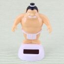 Figura asintiendo con la cabeza Solar - Luchador de sumo