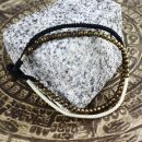Geflochtenes Armband Messing Glöckchen schwarz beige Armschmuck Tribal Makrameeschmuck