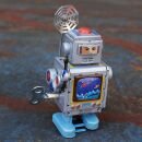 Roboter Raumfahrer Astronaut mit Werkzeug Blechroboter