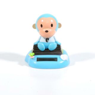 Personaggio con testa oscillante Piccola scimmia blu