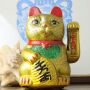 Agitando gato chino - Maneki neko de carámica - 22 cm - oro
